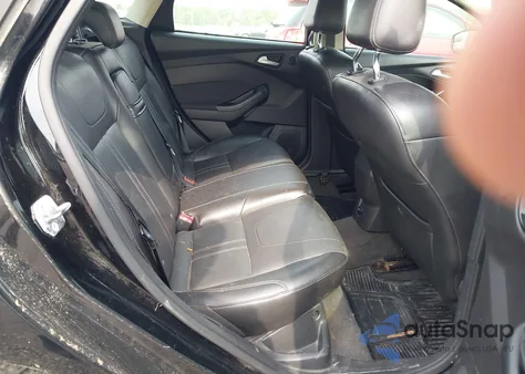 2012 Ford Focus Titanium z USA, uszkodzony, nr VIN 1FAHP3N28CL225852